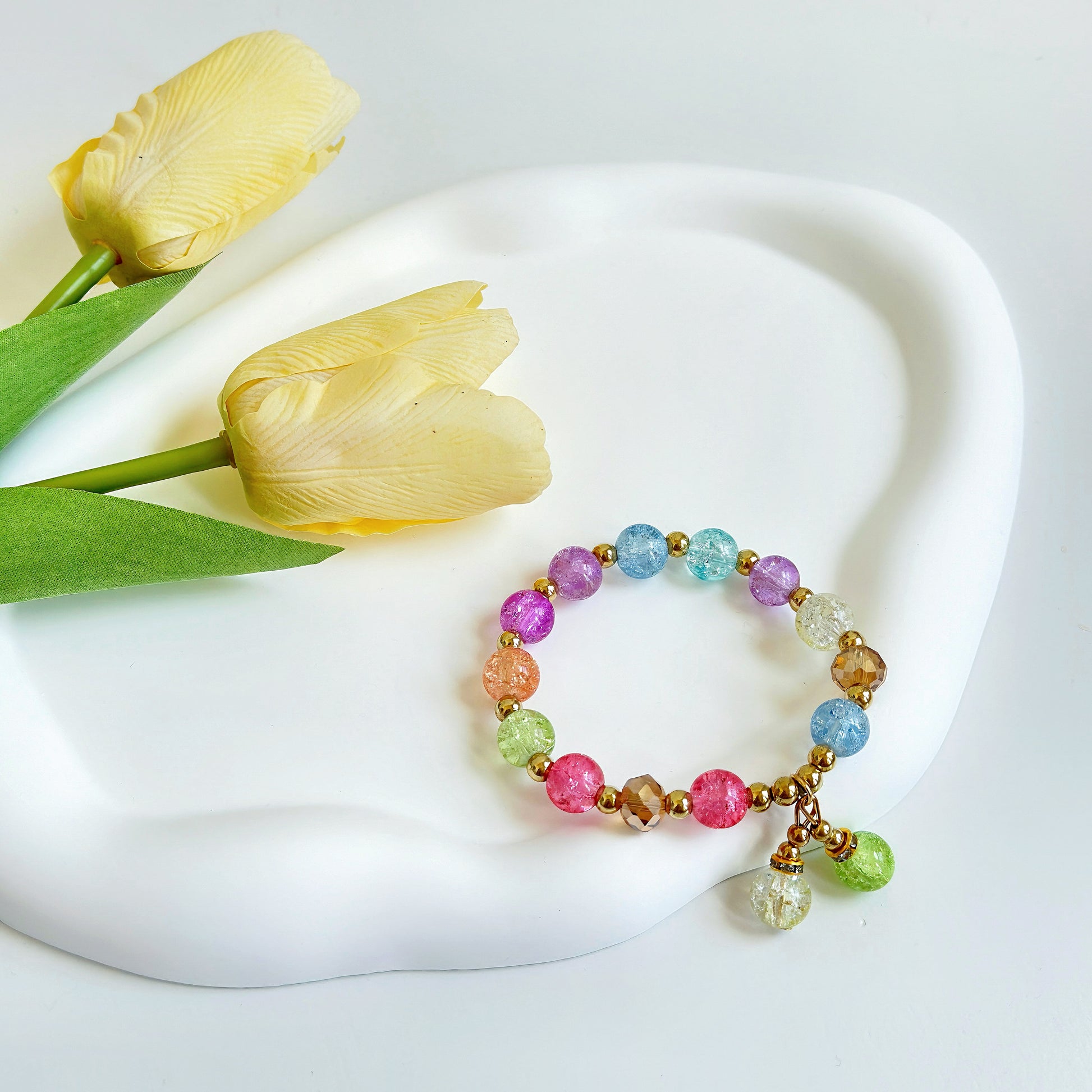 A pretty, shining bracelet with light colors. A cute and simple jewelry piece, perfect for a gift for a daughter, gift for a wife, gift for a girlfriend, or gift for a sister.