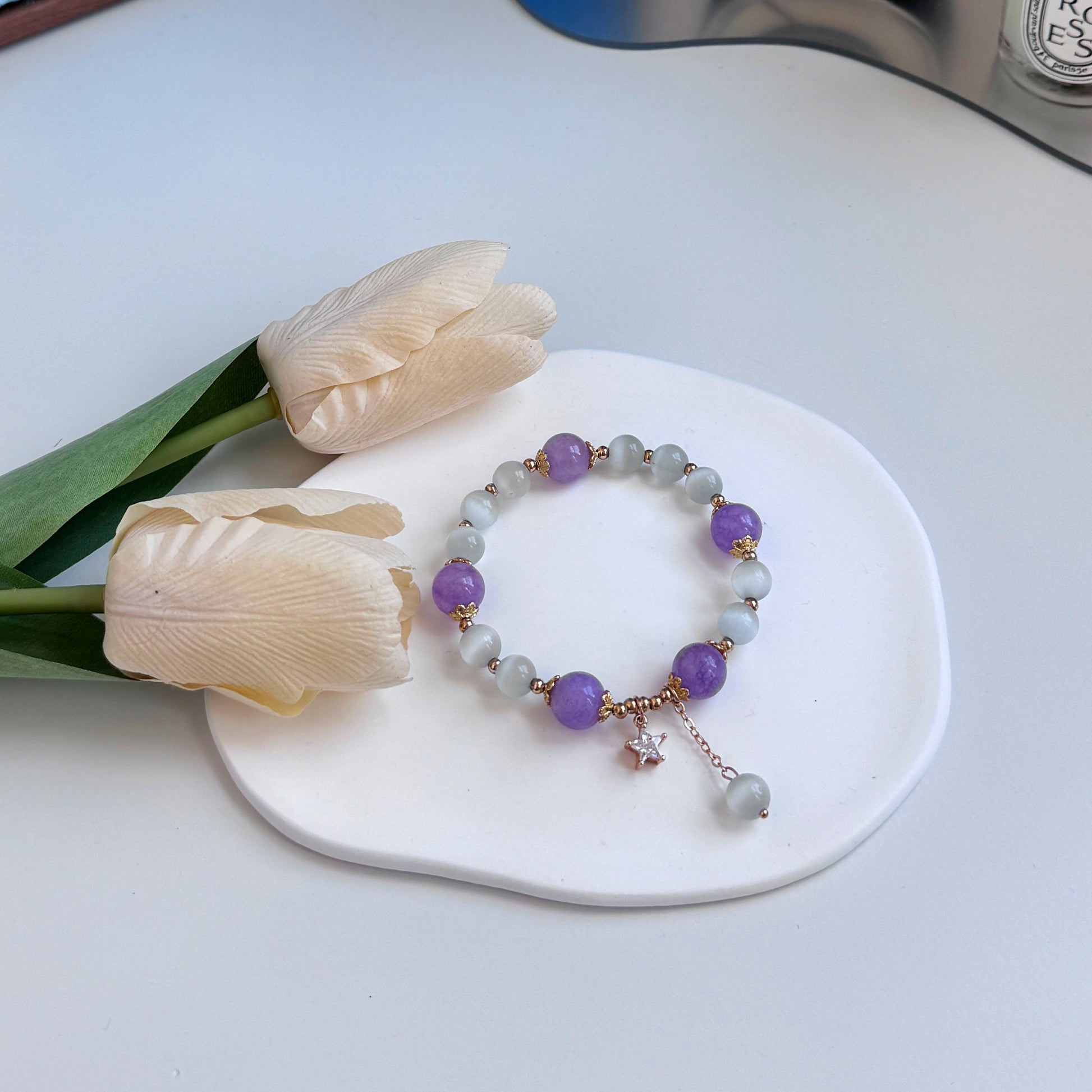 A cute bracelet with amethyst and Tiger's Eye beads, ideal as a gift for girlfriend, gift for sister, gift for daughter, gift for wife, or gift for friend.