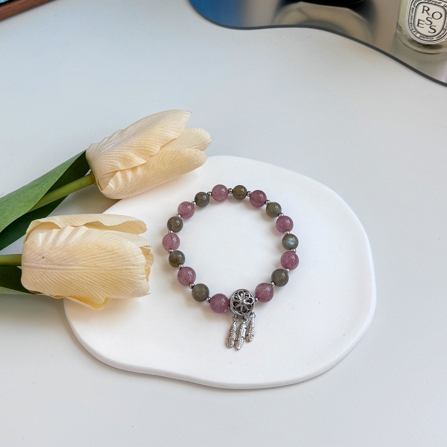 A cute bracelet with strawberry quartz and moonstone beads, silver accents, perfect as a gift for girlfriend, gift for sister, gift for daughter, gift for wife, or gift for friend.