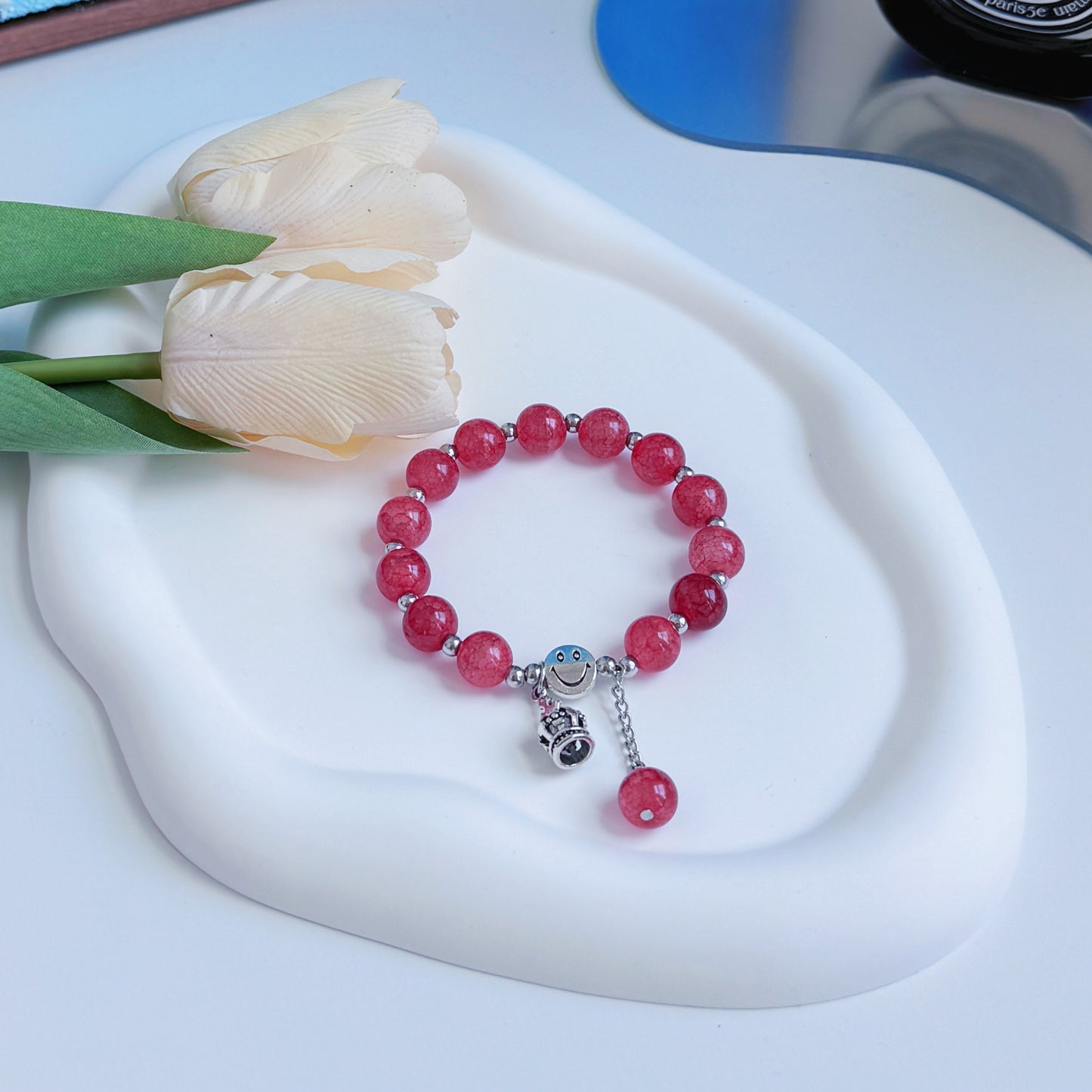 A regal red bracelet, adding fashion to any outfit, a piece of jewelry perfect for a gift for mom, daughter, sister, girlfriend, or wife.