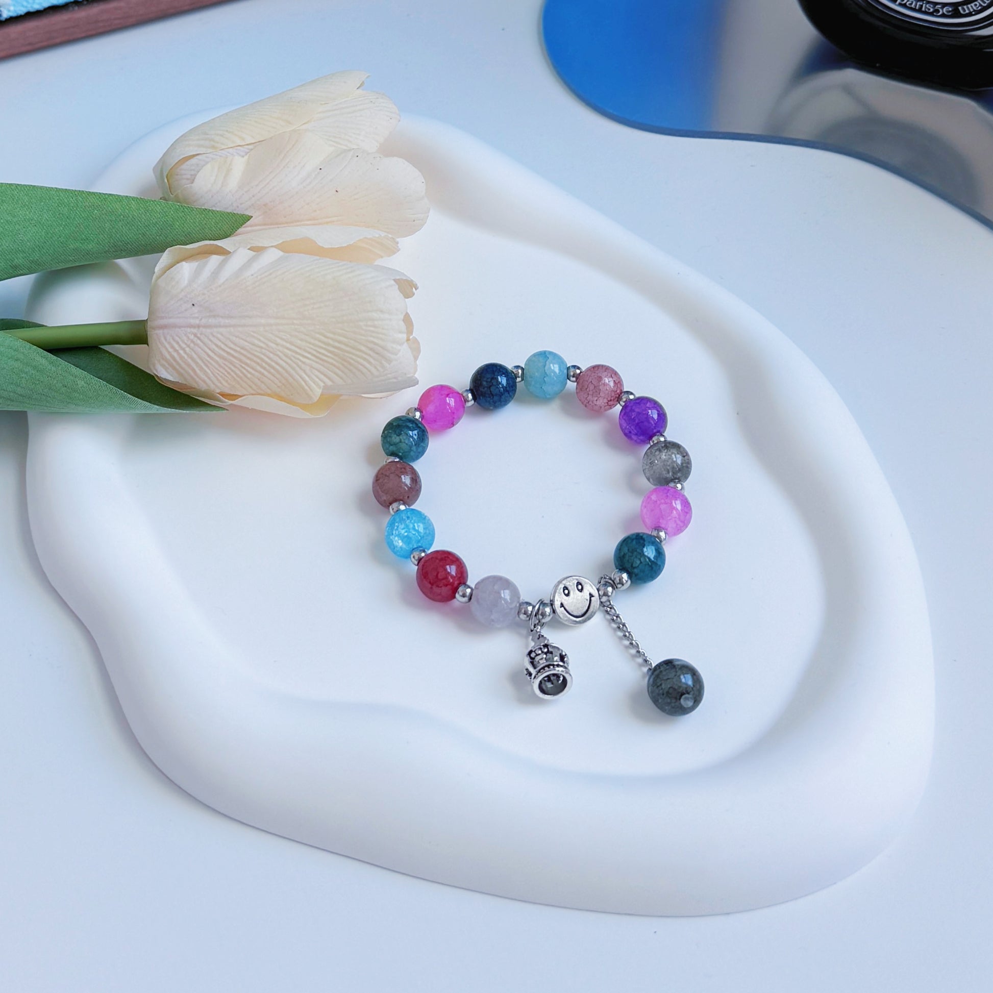 A stunning multi-colored glass bead bracelet, a perfect piece of jewelry gift for daughter, gift for sister, gift for girlfriend, or gift for wife.