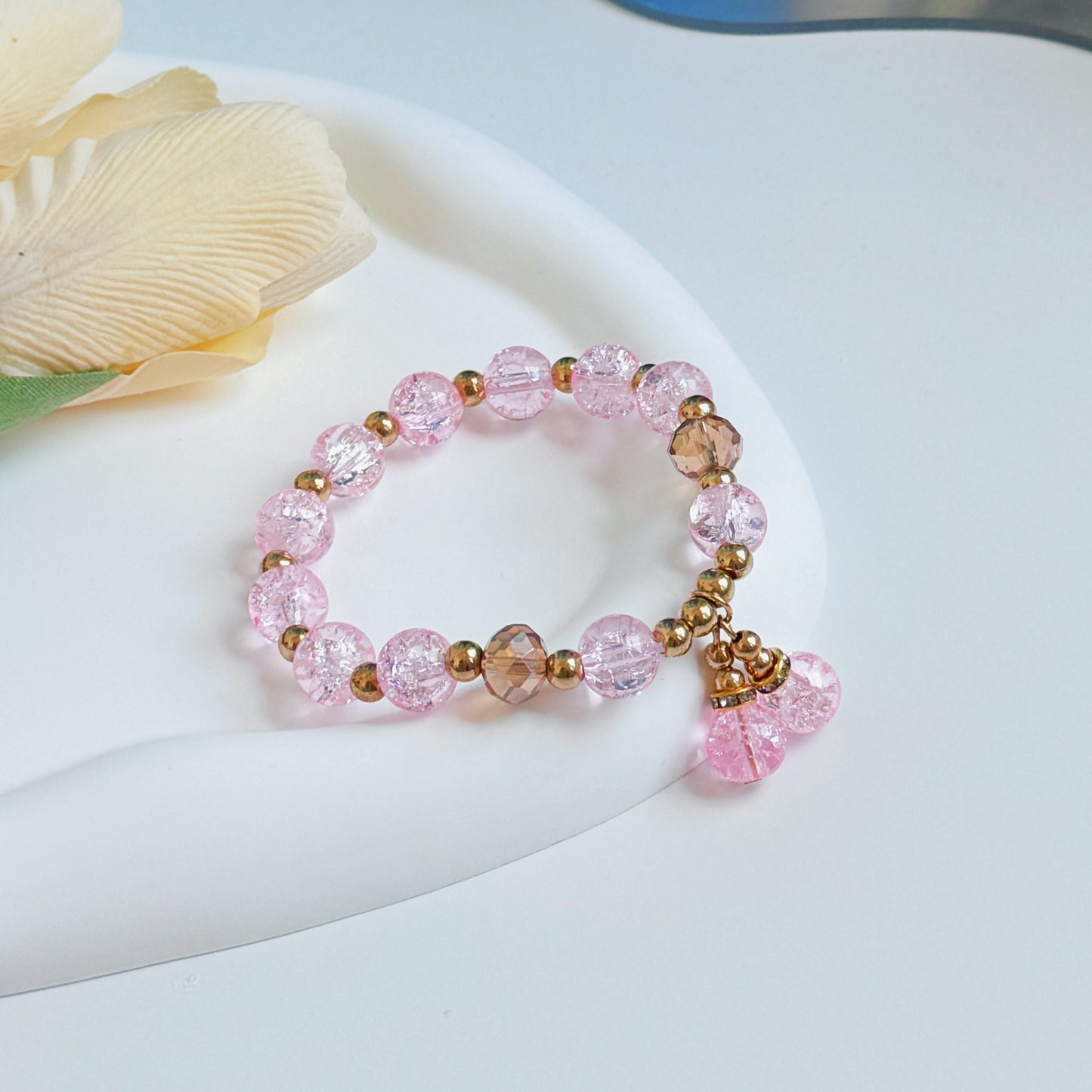 A pretty, elegant bracelet, on a small mirror, the perfect cute jewelry gift for women, perhaps as a gift for wife, a gift for girlfriend, a gift for sisters, or a gift for daughters.