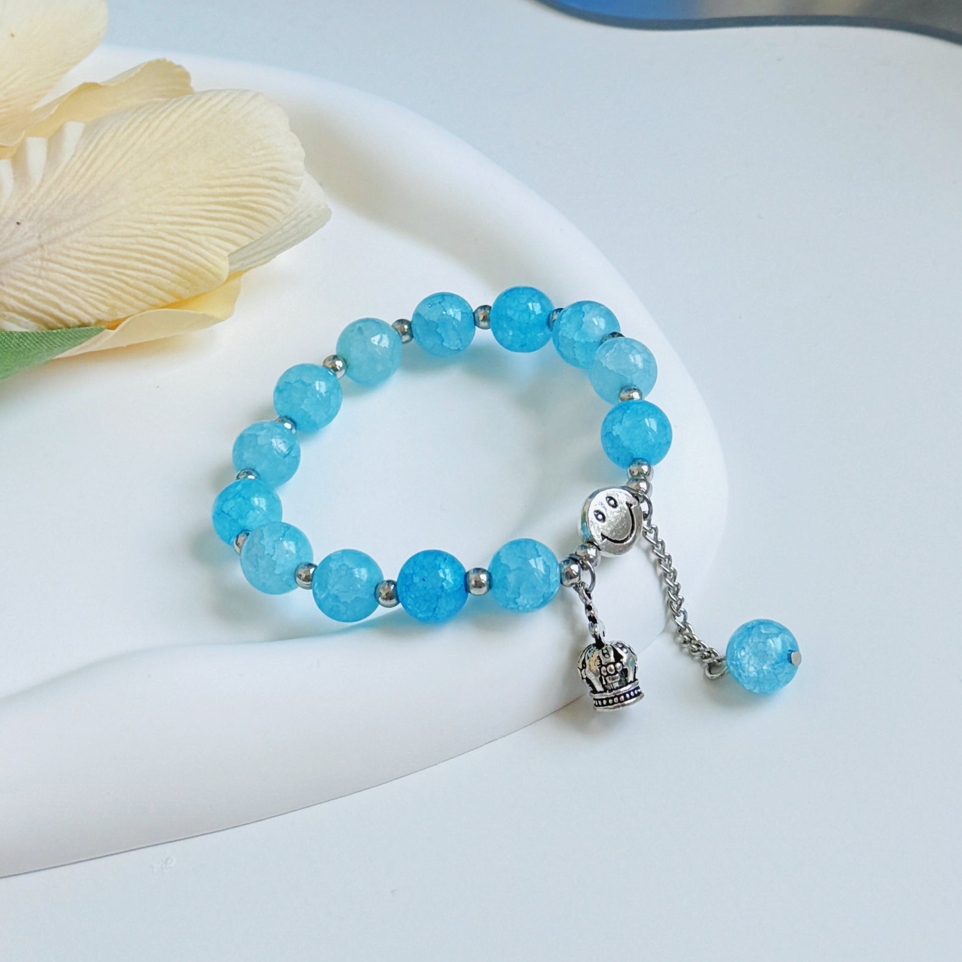 A shiny and pretty bright blue bracelet, perfect for a present for a daughter, wife, girlfriend, sister, or friend.