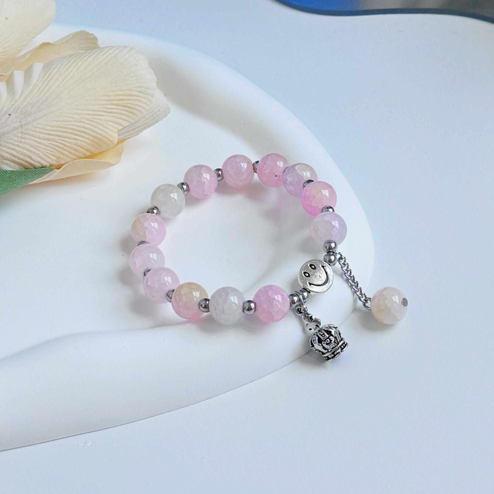 A pretty pink bracelet, perfect for a gift for your mom, daughter, wife, or girlfriend.