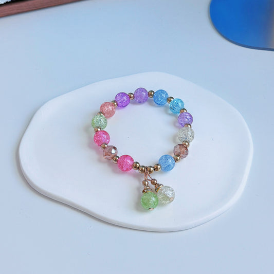 A simple, cute bracelet with multicolored beads, with all the colors of a flowery meadow.