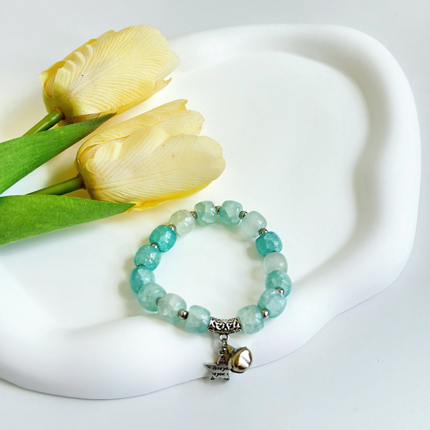 A beautiful, blue beaded bracelet, simple jewelry that's a perfect fashion piece for a young woman or teen girl.