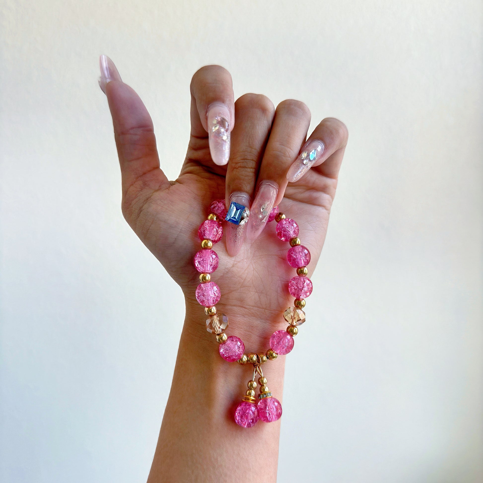 A simple, cute bracelet with bright hot pink glass beads, a perfect gift for her.