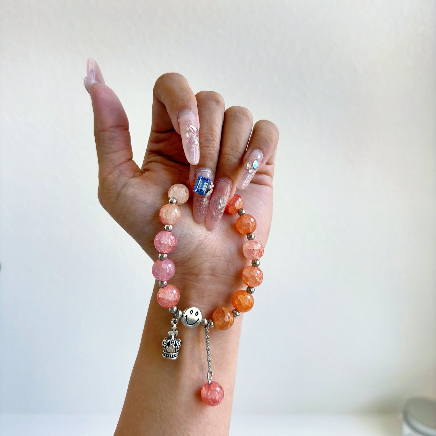 A simple, cute bracelet with amber and pink glass beads, a perfect gift for her.